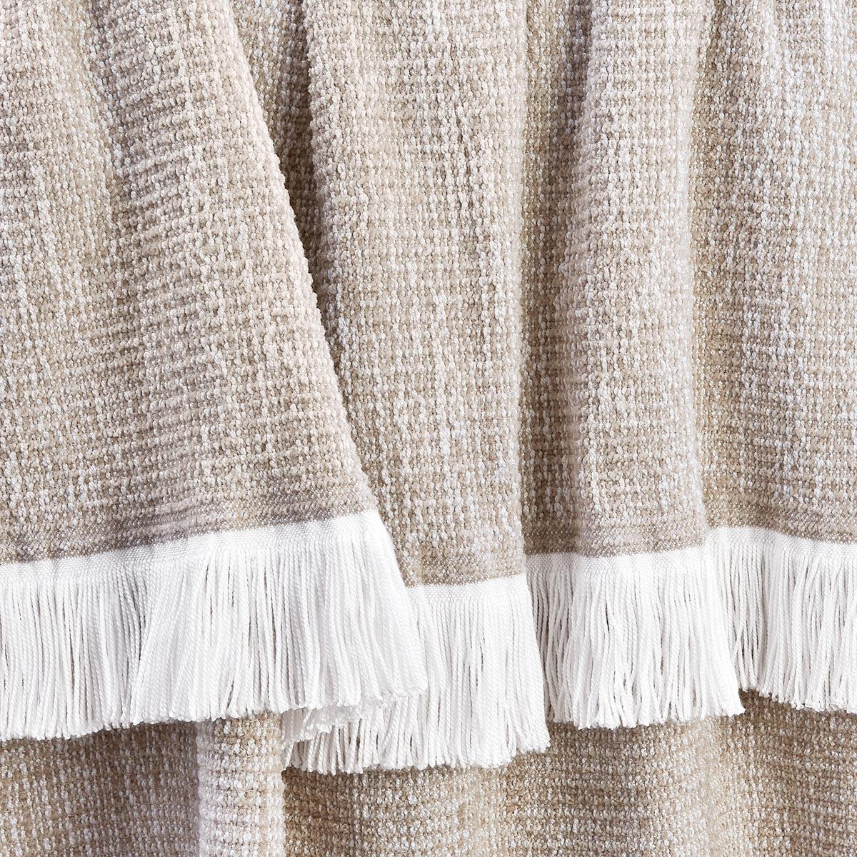 sunbrella-crosshatch-throw-flax-draped-up-close-2_ed92c0af-375b-4b92-87b3-fe77d9745e1b.jpg