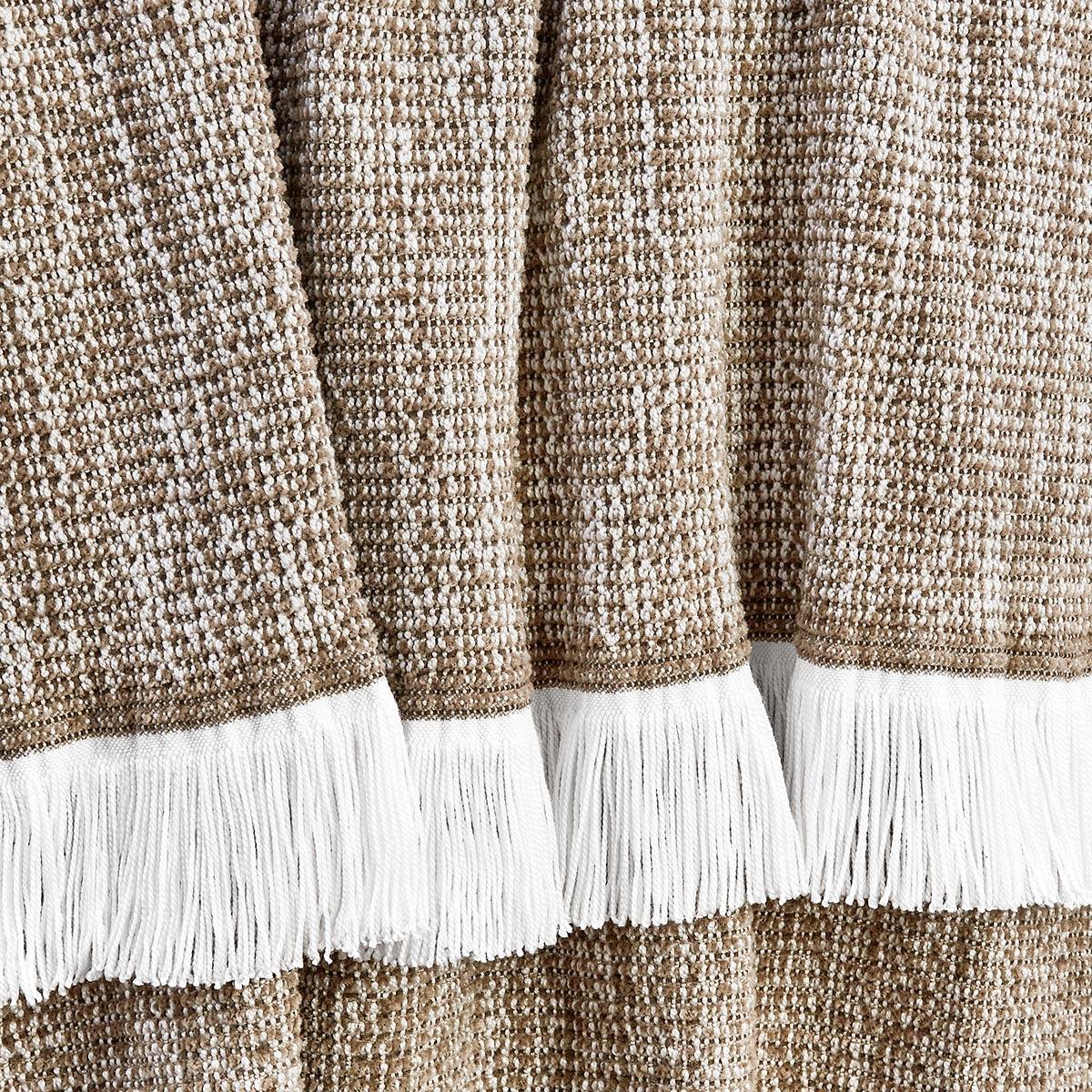 sunbrella-crosshatch-throw-latte-draped-up-close-2_9826d54d-d841-4adb-9be4-69552126af2d.jpg