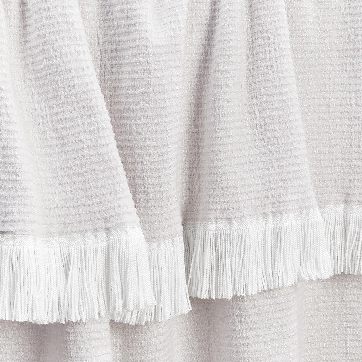 sunbrella-crosshatch-throw-white-draped-up-close-2_dcd93226-0d48-40f7-8885-6ef2d2af1dbe.jpg